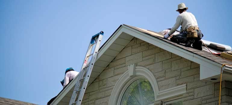 Men Performing Roof Repair in Shelby Township MI
