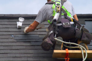 Roofer Performing Work and Inspection on Roof
